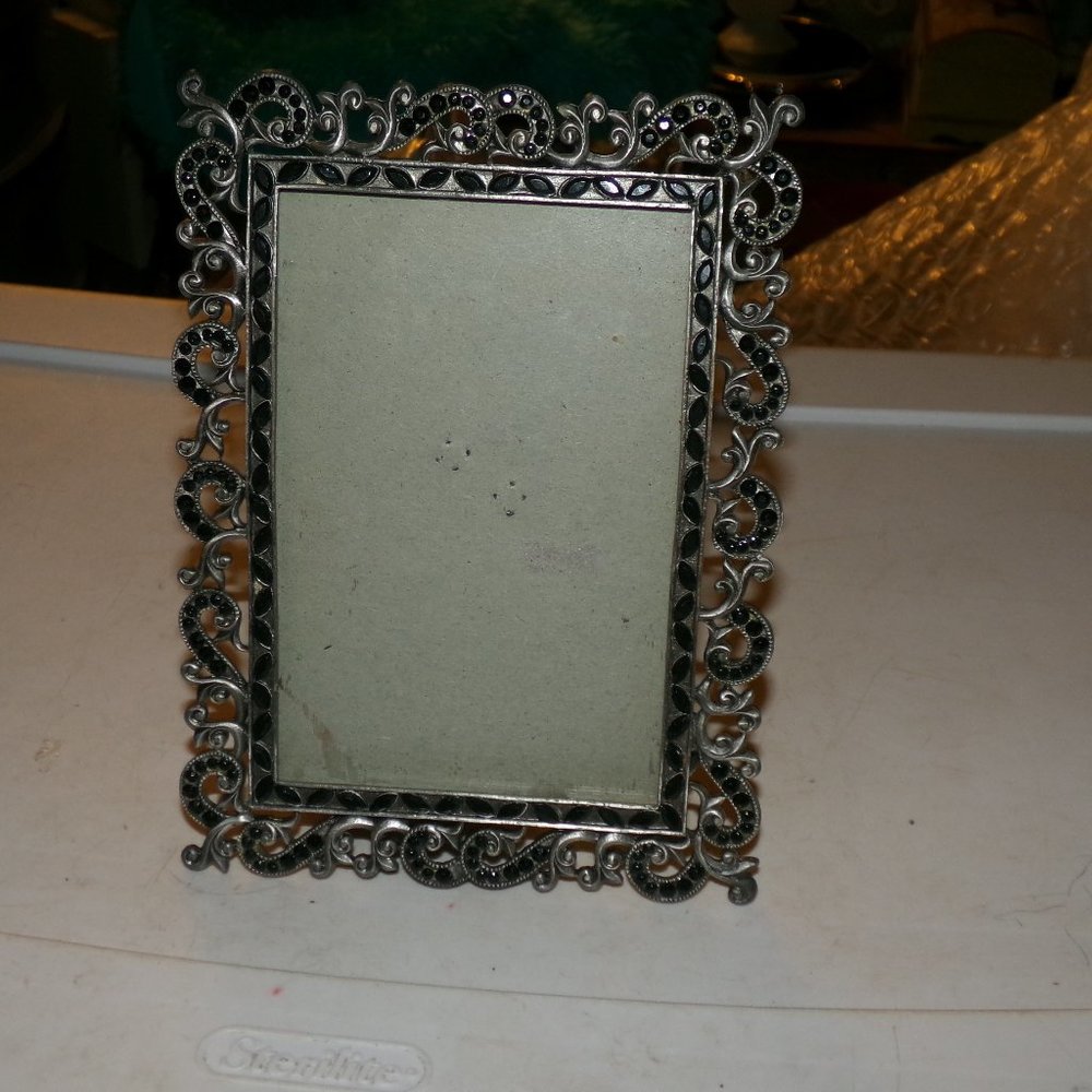 vintage metal &glass frame with gems.